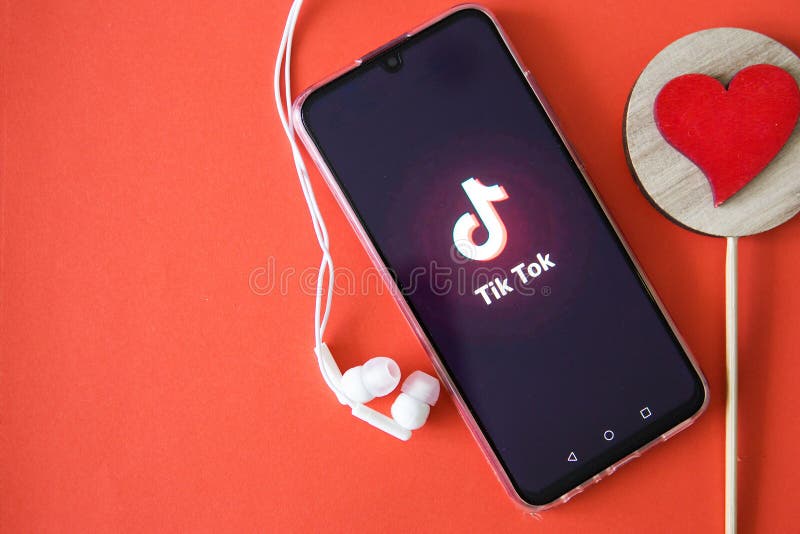 30 ое. Generation z's Nostalgia. Tik Tok logo with Red Heart. Headphones with Cross on logo.