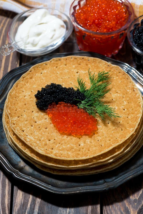 Масленица блины с черной икрой