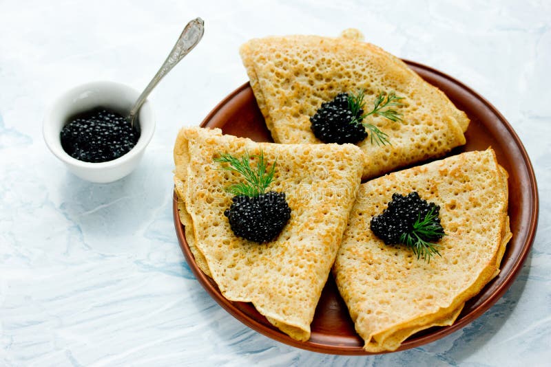 Блины с черной икрой