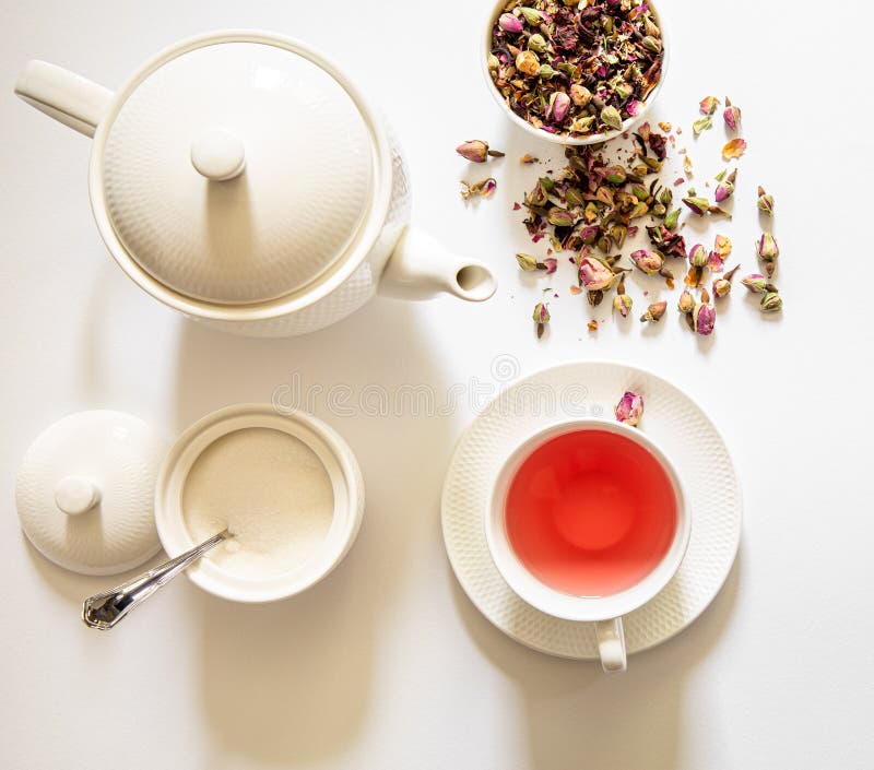 一杯白杯玫瑰花草茶 茶壶 糖碗 马卡龙甜食 粉红色背景的信封 顶部风景 茶会库存图片 图片包括有弯脚的 收集 一杯白杯玫瑰花草茶 茶壶 糖碗 马卡龙甜食 粉红色背景的信封 顶部风景 茶会库存图片 图片包括有弯脚的 收集