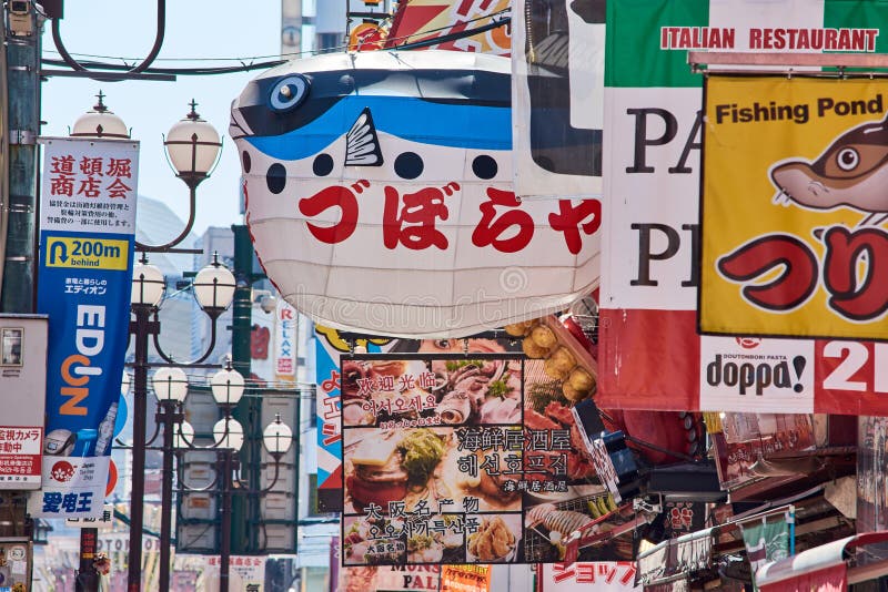 大坂市中心的多顿博里街以其众多的餐馆和商店而闻名编辑类照片 图片包括有都市风景 餐馆 聚会所 大坂市中心的多顿博里街以其众多的餐馆和商店而闻名编辑类照片 图片包括有都市风景 餐馆 聚会所