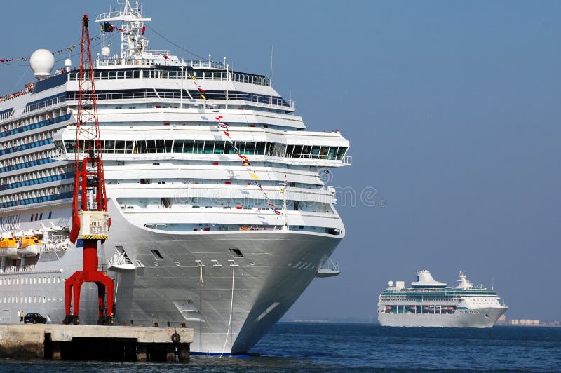 Two luxury cruise ships docked in the port of Lisbon - Portugal. Two luxury cruise ships docked in the port of Lisbon - Portugal