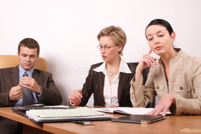 Group of business people preparing to the meeting. Group of business people preparing to the meeting