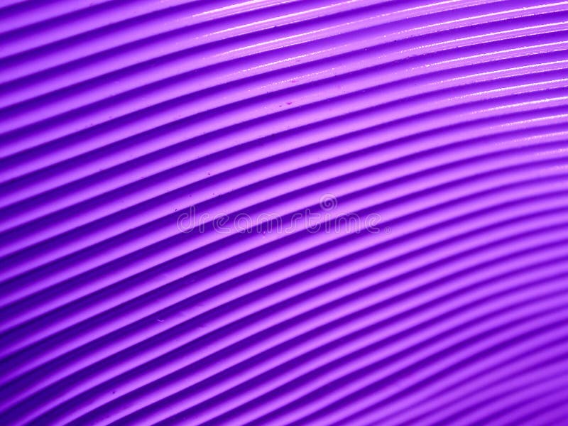 A macro shot of purple computer cord. Useful as a background or texture. A macro shot of purple computer cord. Useful as a background or texture