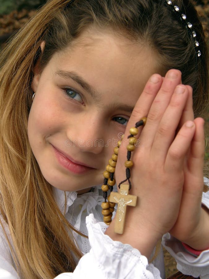 Angel (girl) with rosary in prayer. Angel (girl) with rosary in prayer