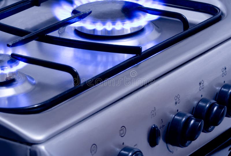 Blue gas flames - stove burner. Blue gas flames - stove burner