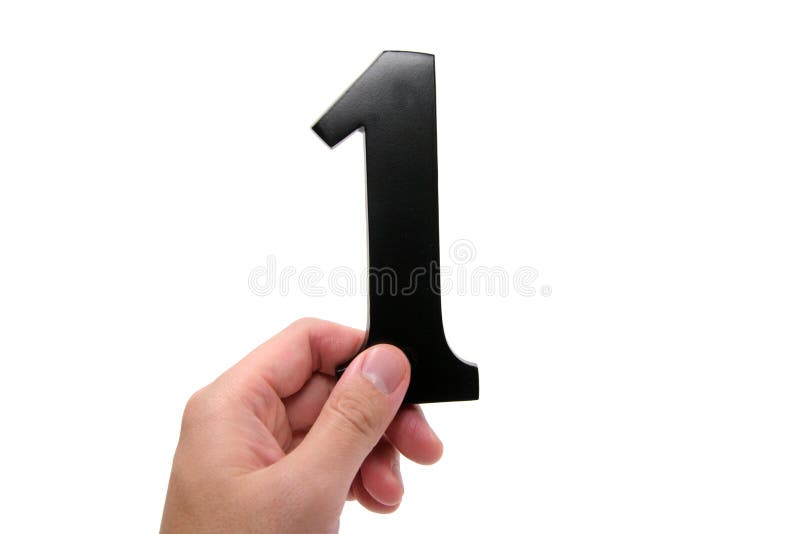 Hand holding number 1 with white background. Hand holding number 1 with white background