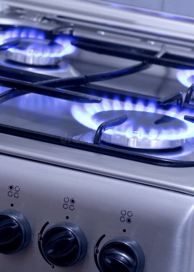 Blue gas flames - stove burner. Blue gas flames - stove burner