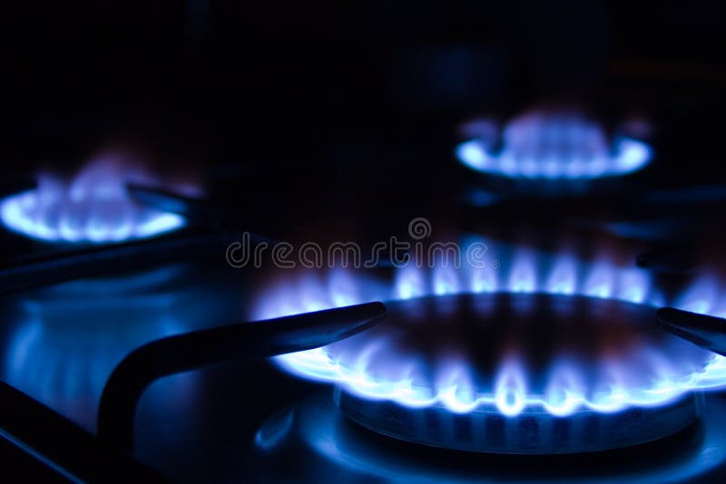 Blue gas flames - stove burner. Blue gas flames - stove burner