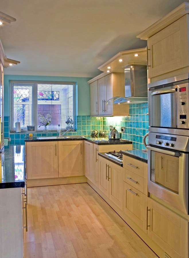 Kitchen shot slightly off centre in UK luxury home. Kitchen shot slightly off centre in UK luxury home