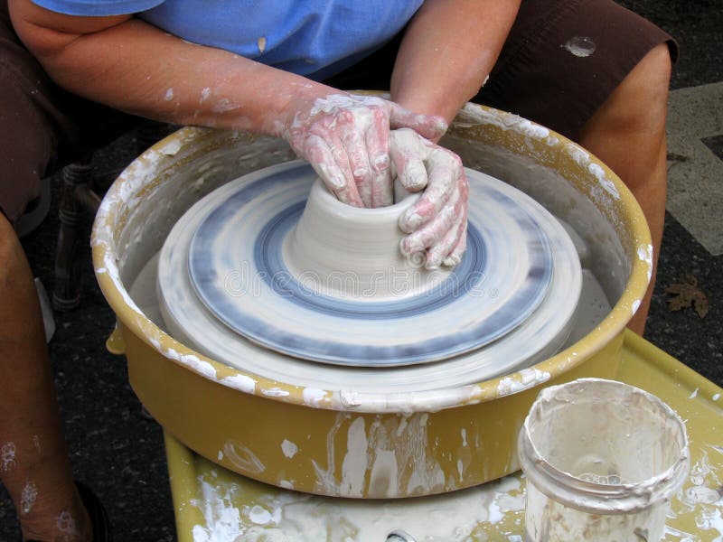 A Close-up Of A Potter Making A Bowl. A Close-up Of A Potter Making A Bowl