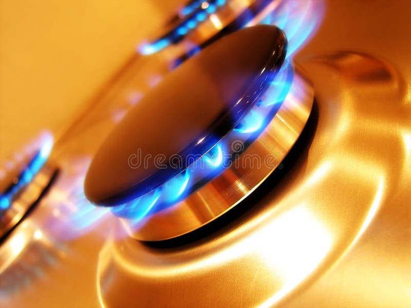 Landscape photo of oven hob gas burner at a dynamic angle. Landscape photo of oven hob gas burner at a dynamic angle.