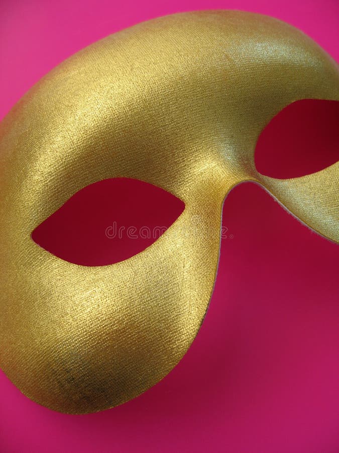 A golden phantom mask. A golden phantom mask.