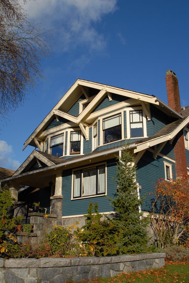 A Craftsman Style house in autumn. A Craftsman Style house in autumn.