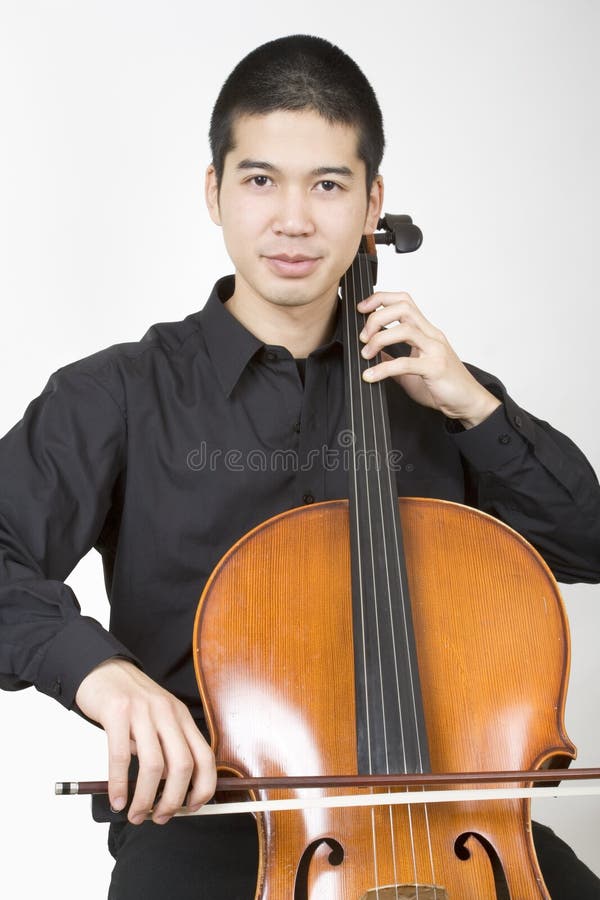 Asian cellist bowing 1. Asian cellist bowing 1