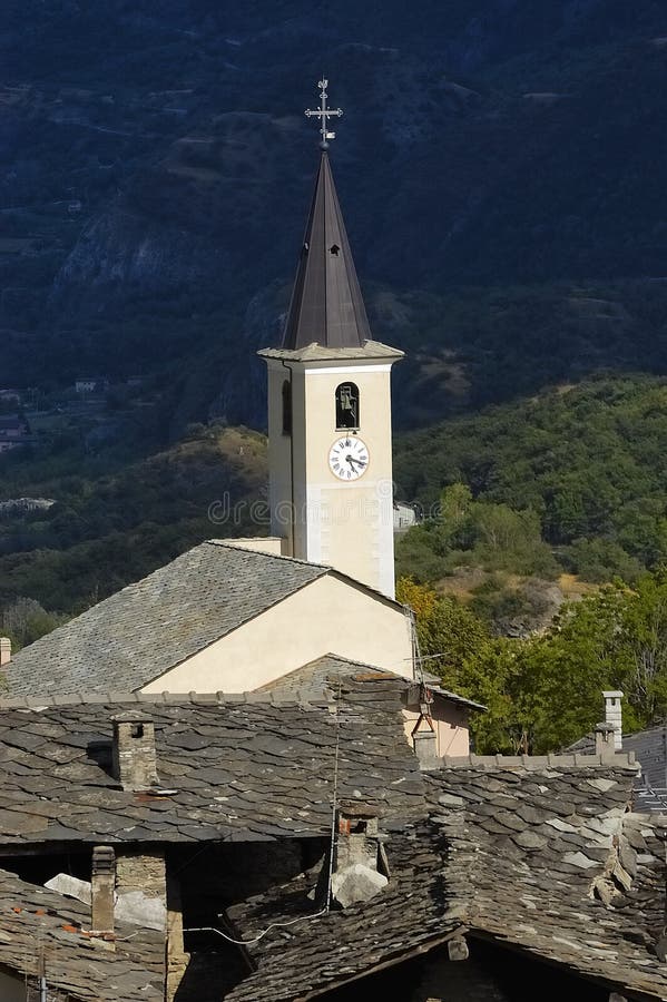 Old, white church spire in the village of Susa. Old, white church spire in the village of Susa