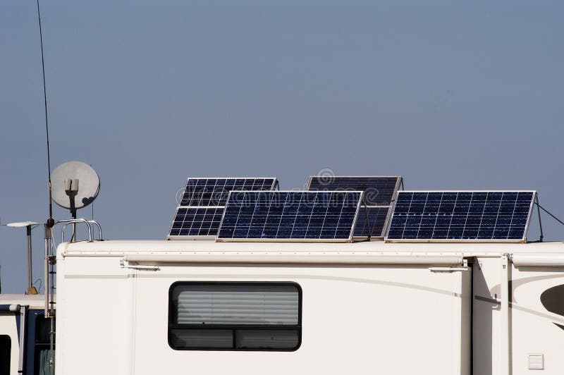 Camping with solar panels for converting energy from the sun to electricity. Camping with solar panels for converting energy from the sun to electricity.