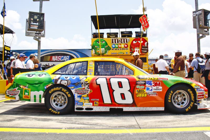 NASCAR driver and 2010 Chase for the Sprint Cup contender Kyle Busch's #18 M&Ms Toyota Camry as it sits on pit road before the start of the 2010 Coca Cola 600. Busch finished 3rd; his brother Kurt won the race. NASCAR driver and 2010 Chase for the Sprint Cup contender Kyle Busch's #18 M&Ms Toyota Camry as it sits on pit road before the start of the 2010 Coca Cola 600. Busch finished 3rd; his brother Kurt won the race.