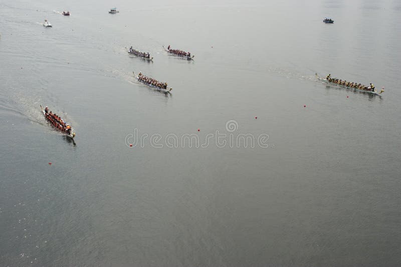 PUTRAJAYA, MALAYSIA - JUNE 19 : International participant is seen rowing in their boats during the 1Malaysia International Dragon Boat Festival 2010 (1MIDBF) JUNE 19, 2010 in Putrajaya Malaysia. PUTRAJAYA, MALAYSIA - JUNE 19 : International participant is seen rowing in their boats during the 1Malaysia International Dragon Boat Festival 2010 (1MIDBF) JUNE 19, 2010 in Putrajaya Malaysia.