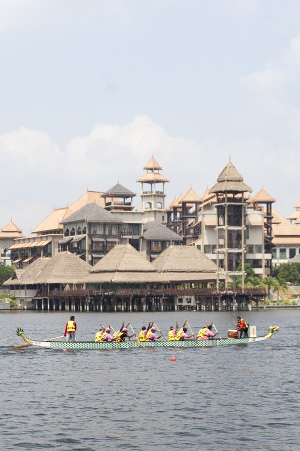 PUTRAJAYA, MALAYSIA - JUNE 19 : International participant is seen rowing their boats during the 1Malaysia International Dragon Boat Festival 2010 (1MIDBF) JUNE 19, 2010 in Putrajaya Malaysia. PUTRAJAYA, MALAYSIA - JUNE 19 : International participant is seen rowing their boats during the 1Malaysia International Dragon Boat Festival 2010 (1MIDBF) JUNE 19, 2010 in Putrajaya Malaysia.