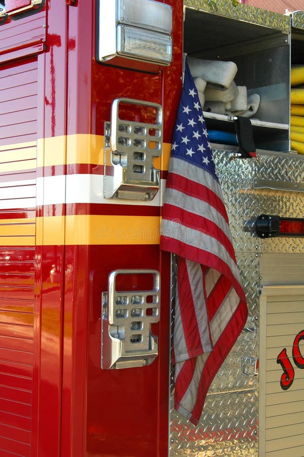 A parked firetruck ready for inspection. A parked firetruck ready for inspection.