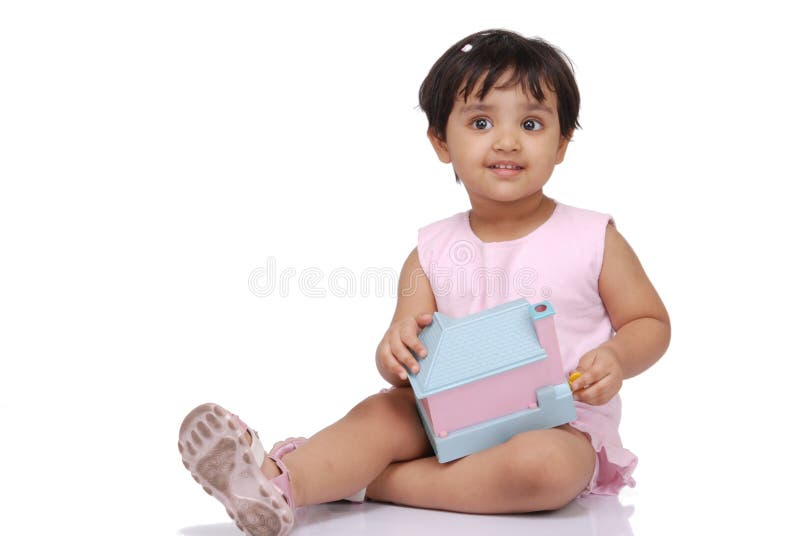 2-3 years old baby girl with toy house. 2-3 years old baby girl with toy house