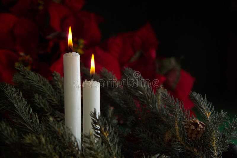 2 advent candles with greenery. 2 advent candles with greenery