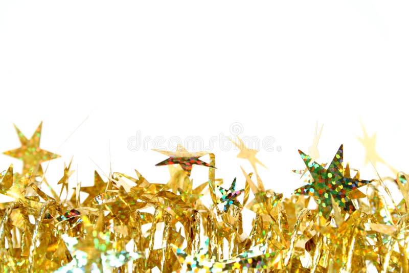 Celebratory tinsel of golden color with christmas stars. Celebratory tinsel of golden color with christmas stars