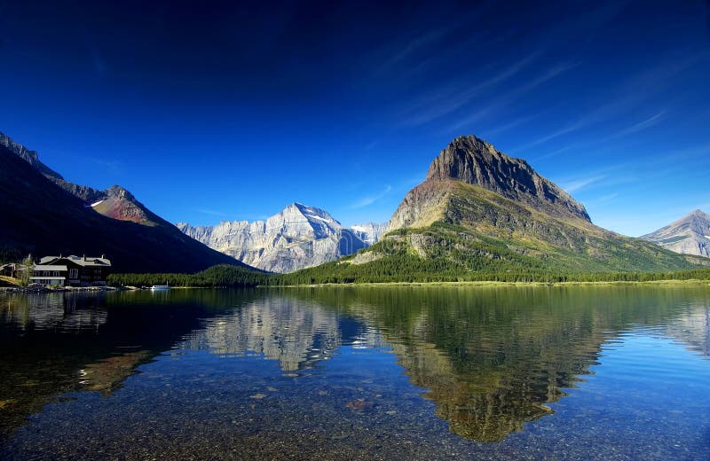 Swiftcurrent Lake with Mt Grinnell at Many Galcier, Glacier National Park, Montana, USA. Swiftcurrent Lake with Mt Grinnell at Many Galcier, Glacier National Park, Montana, USA.