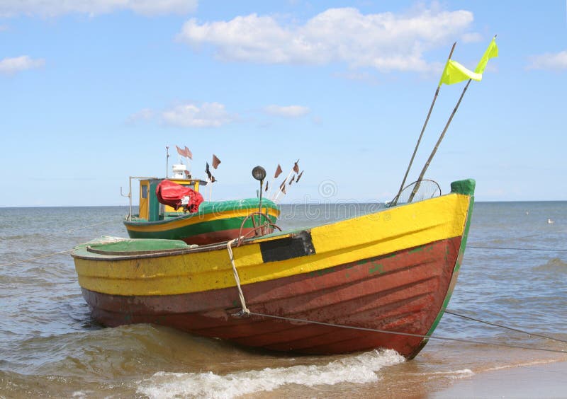 Old fishing boats against beautiful sky. Old fishing boats against beautiful sky