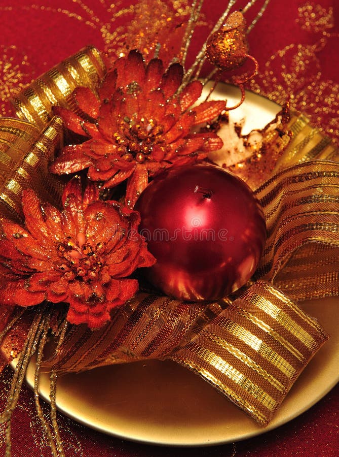 The image depicts a candle with a typical christmas decorations, adaptable to any context relates to christmas. The image depicts a candle with a typical christmas decorations, adaptable to any context relates to christmas.