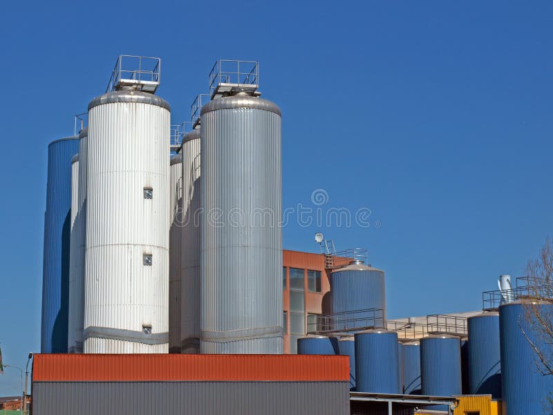 Chemical factory metal tanks, view close up. Chemical factory metal tanks, view close up