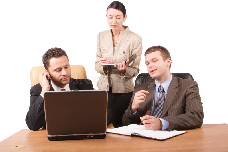 Group of 3 business people working together with laptop in the office - isolated. Group of 3 business people working together with laptop in the office - isolated