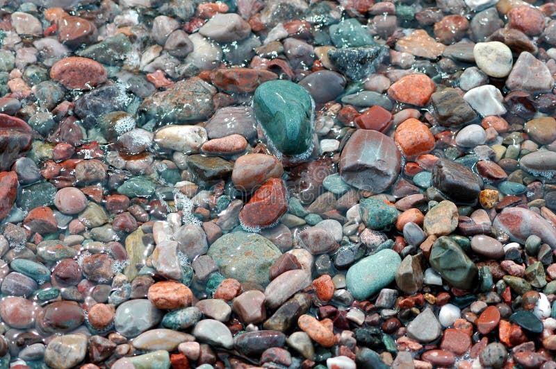 Colored stones on ocean shore,St.Martins,New Brunswick,Canada,Atlantic ocean. Colored stones on ocean shore,St.Martins,New Brunswick,Canada,Atlantic ocean