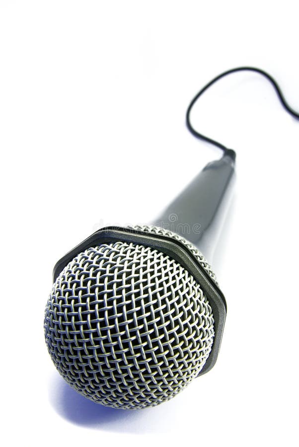 View of an usual microphone isolated over a white background. View of an usual microphone isolated over a white background.