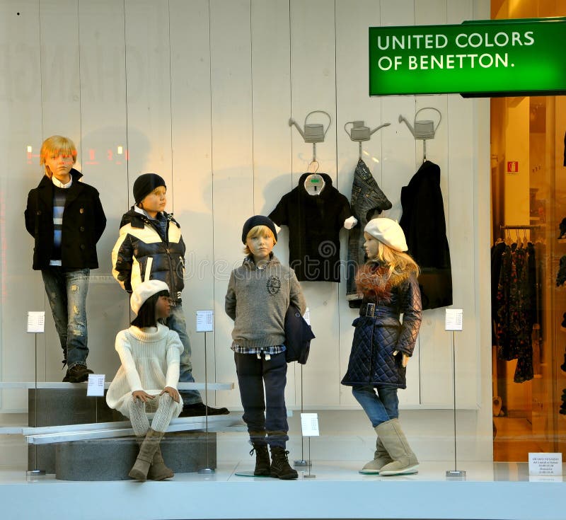 Fall winter fashion for children in 2011 in Italy. United colors of Benetton fashion boutique with kid mannequins in Florence, Italy.italian kids shop. Fall winter fashion for children in 2011 in Italy. United colors of Benetton fashion boutique with kid mannequins in Florence, Italy.italian kids shop