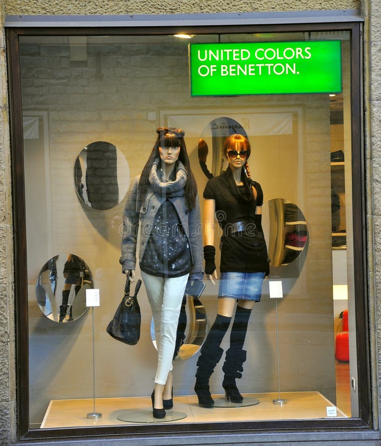 Fall winter fashion for women in Italy. United Colors of Benetton fashion boutique with mannequins in Florence, Italy.made in Italy concept. Fall winter fashion for women in Italy. United Colors of Benetton fashion boutique with mannequins in Florence, Italy.made in Italy concept