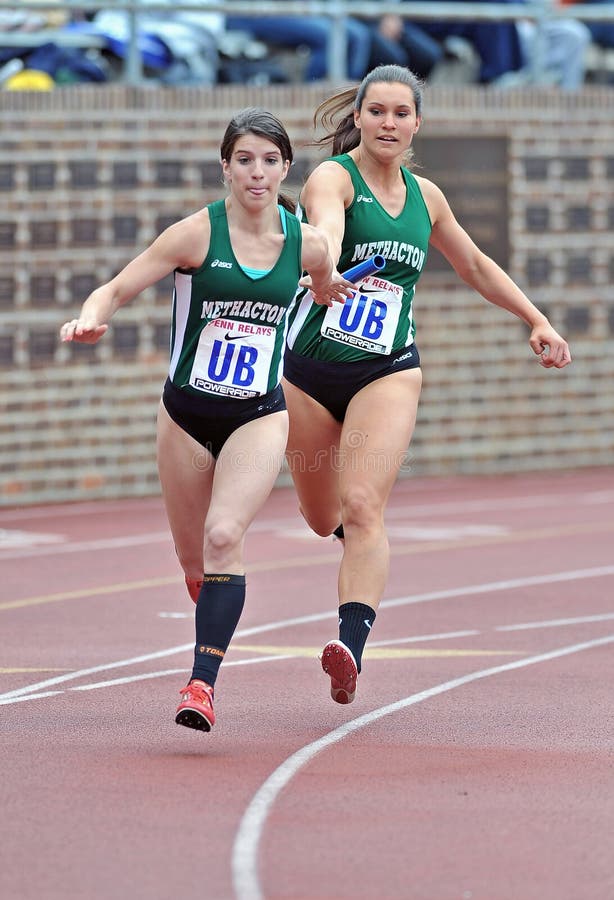 2012 Track Female HS Relay Runner Editorial Image Image of fitness