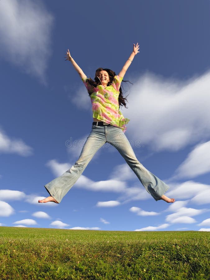 Jump girl with hair on sky with clouds 2. Jump girl with hair on sky with clouds 2