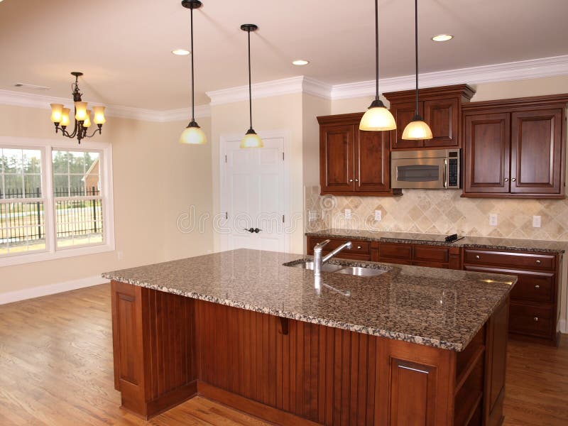 Luxury Kitchen with granite counter top center Island. Luxury Kitchen with granite counter top center Island