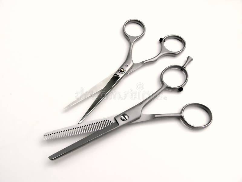 Pair of hair cutting scissors isolated on white. Pair of hair cutting scissors isolated on white