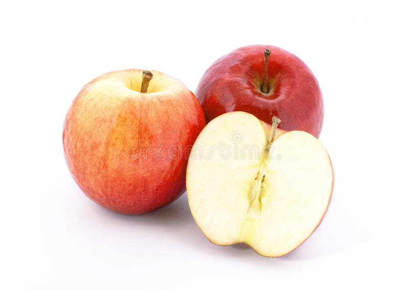 3 fresh apples with one sliced part isolated on white. 3 fresh apples with one sliced part isolated on white