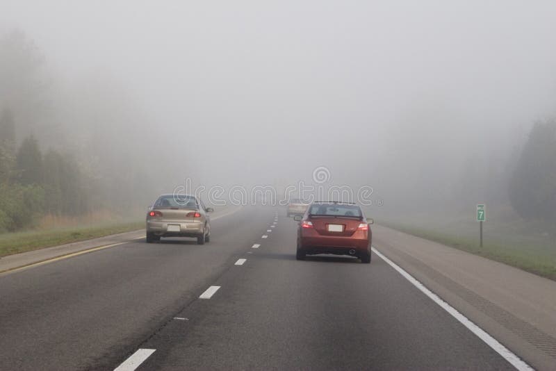 Traveling in fog is dangerous, theses vehicles are battling with a very limited vision. Traveling in fog is dangerous, theses vehicles are battling with a very limited vision