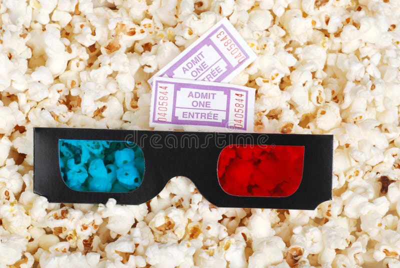 3D glasses movie tickets and popcorn