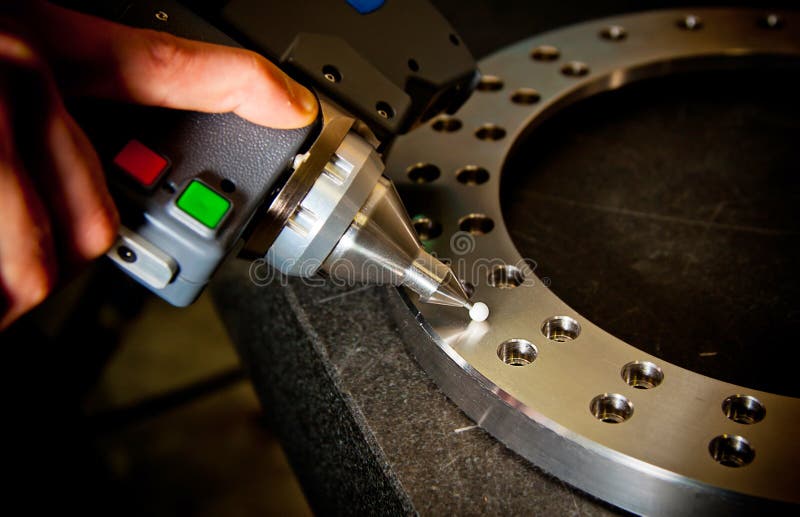 Detail of the tip of a 3d laser scanner mechanical arm. Shallow depth of field, focus on the tip. Detail of the tip of a 3d laser scanner mechanical arm. Shallow depth of field, focus on the tip.