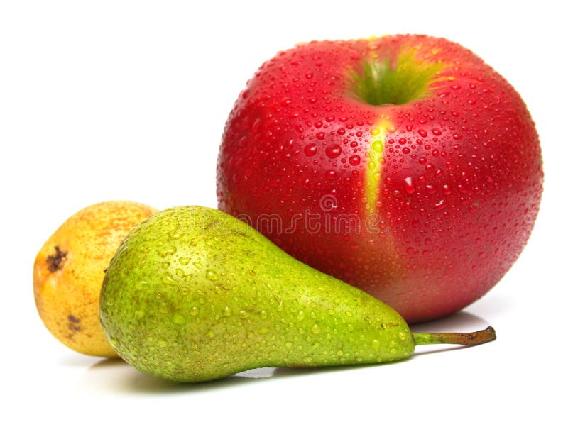 Juicy green and yellow pears and ripe red apple. Isolated, shallow DOF. Juicy green and yellow pears and ripe red apple. Isolated, shallow DOF.