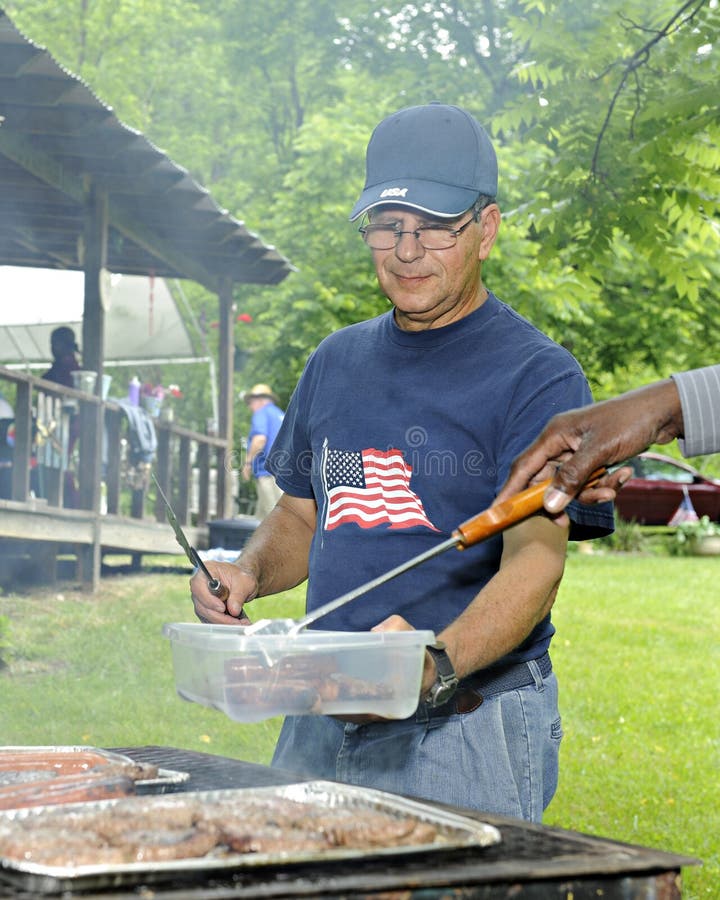 At a 4th of July Picnic Grill Stock Photo Image of grilling, male