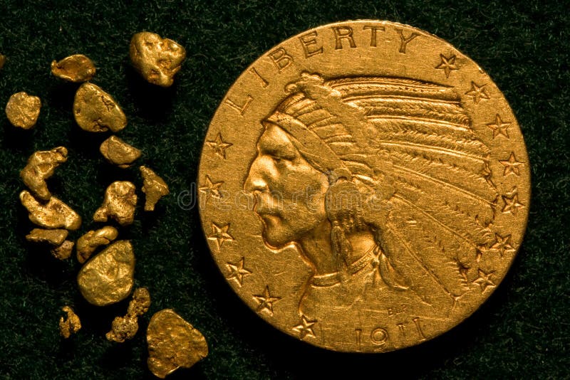 5 1911 klumpar för indier för huvud för myntguld arkivfoto