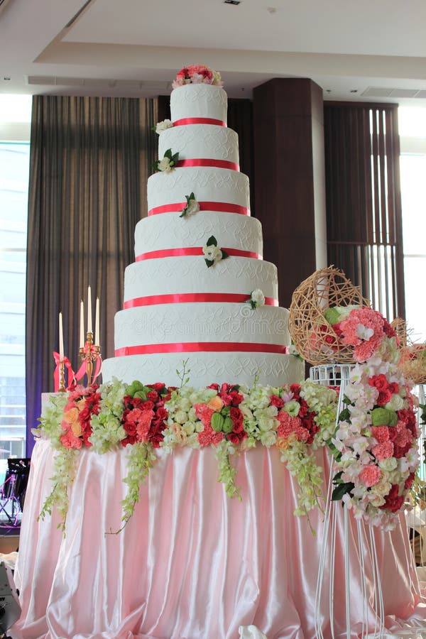 7-layer white wedding cake in party