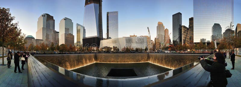 A view of the memorial pools at dusk at the National September 11 Memorial at the World Trade Center site in New York City. The foreground shows the South memorial pool. A view of the memorial pools at dusk at the National September 11 Memorial at the World Trade Center site in New York City. The foreground shows the South memorial pool.